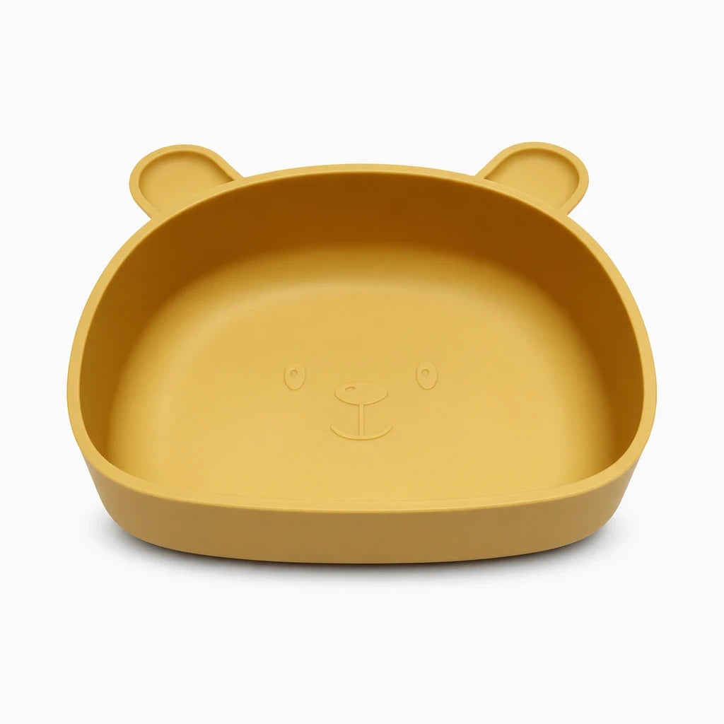 Assiette silicone bébé rose avec ventouse de fixation sur plateau de table