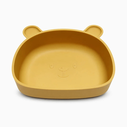 Assiette silicone bébé rose avec ventouse de fixation sur plateau de table