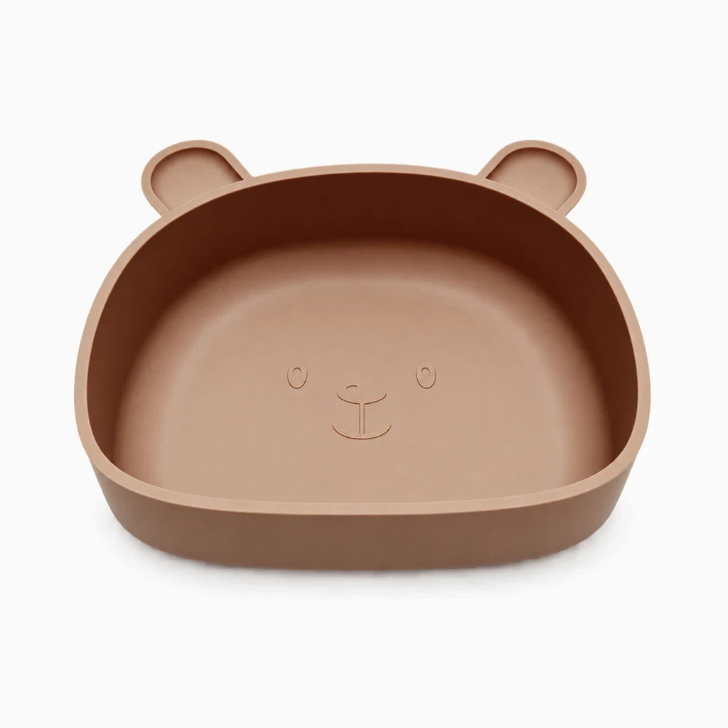 Assiettes bébé silicone colorées empilées montrant la souplesse du matériau
