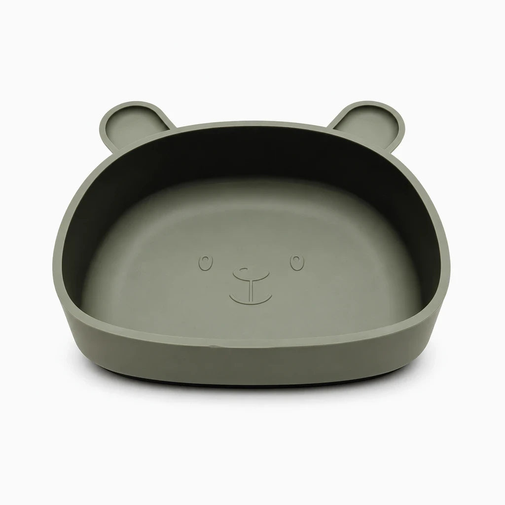 Détail de la ventouse fixant l'assiette silicone bébé sous le bol de repas
