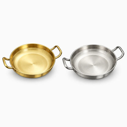 Casseroles et poêles en inox brillant adaptées à la cuisson du riz et fruits de mer