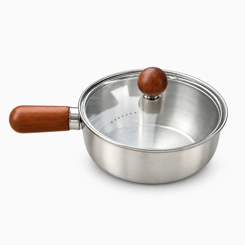 Manche en bois ergonomique de la casserole d'induction, prise stable et confortable