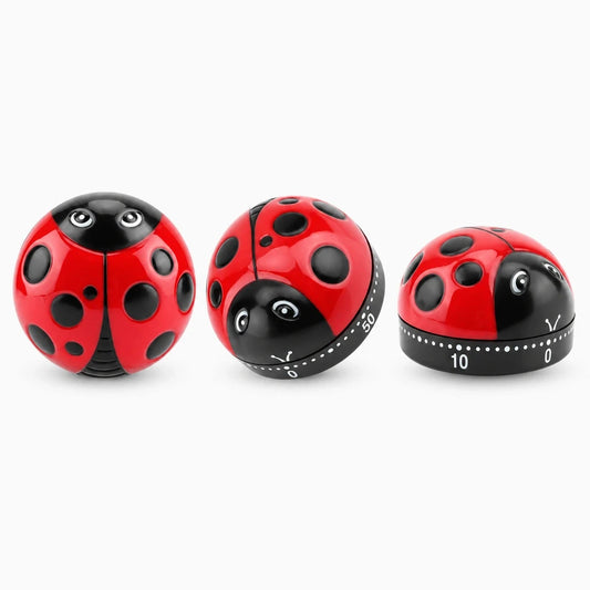 Minuteur cuisine avec sonnerie en forme de coccinelle rouge et noir sur plan de travail