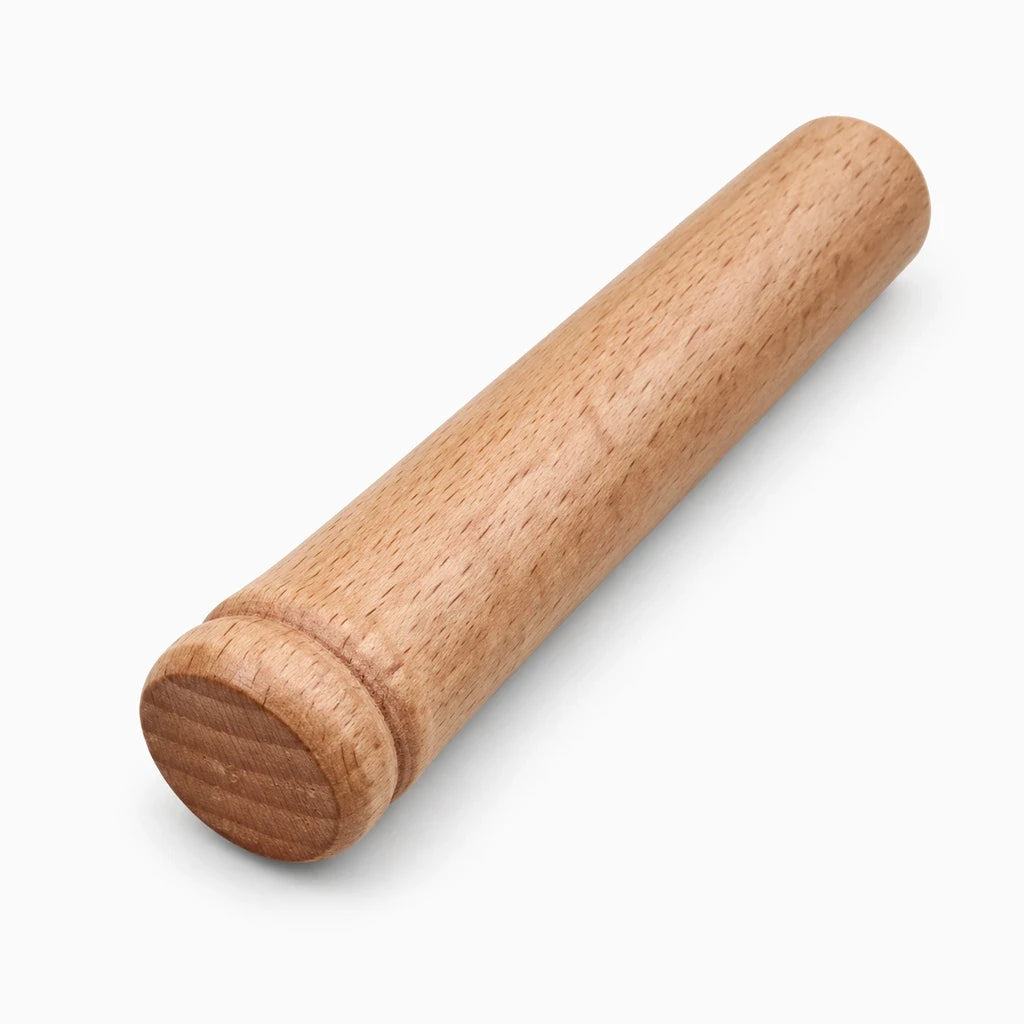 Pilon de cuisine en bois, détail de la tête arrondie