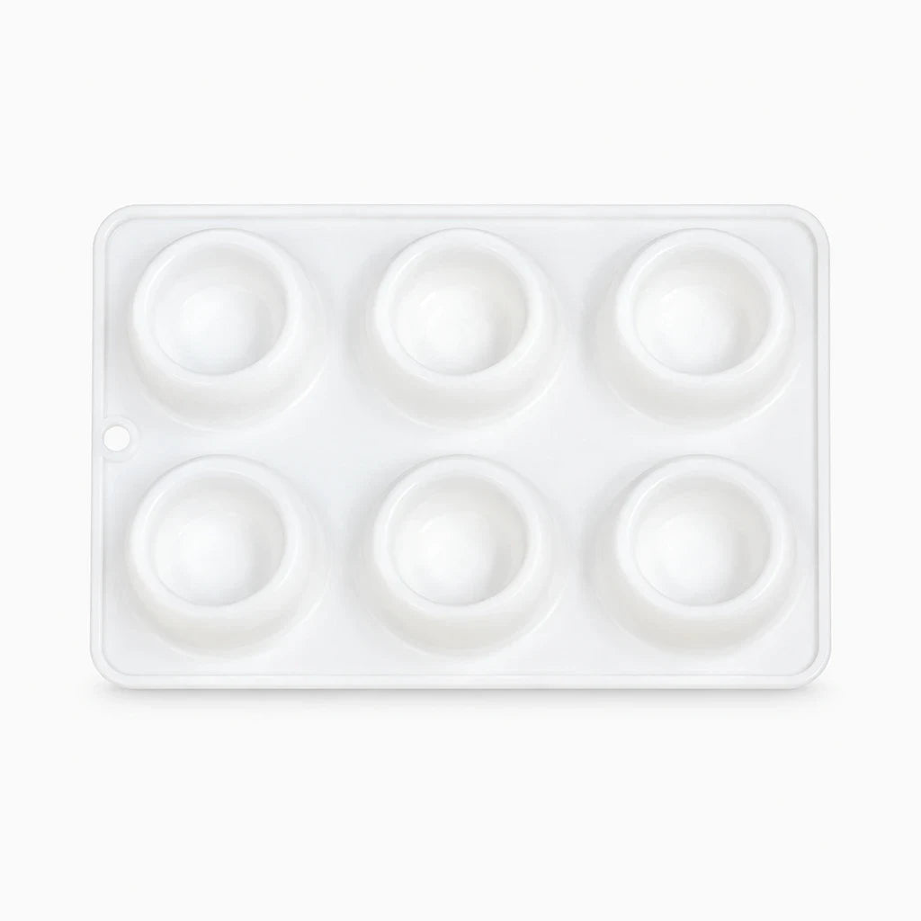 Moule en silicone compact rangé après utilisation en pâtisserie