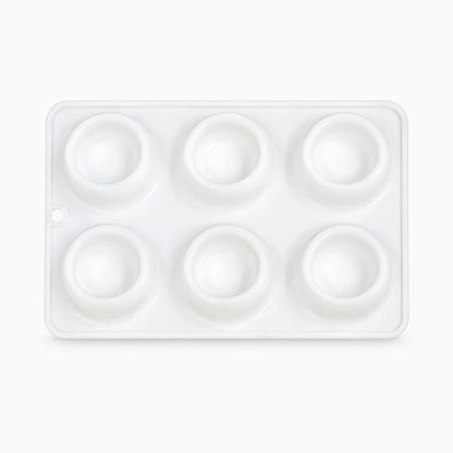 Moule en silicone compact rangé après utilisation en pâtisserie