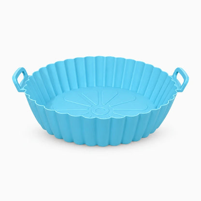 Moules en silicone air fryer empilés en rouge, noir et vert
