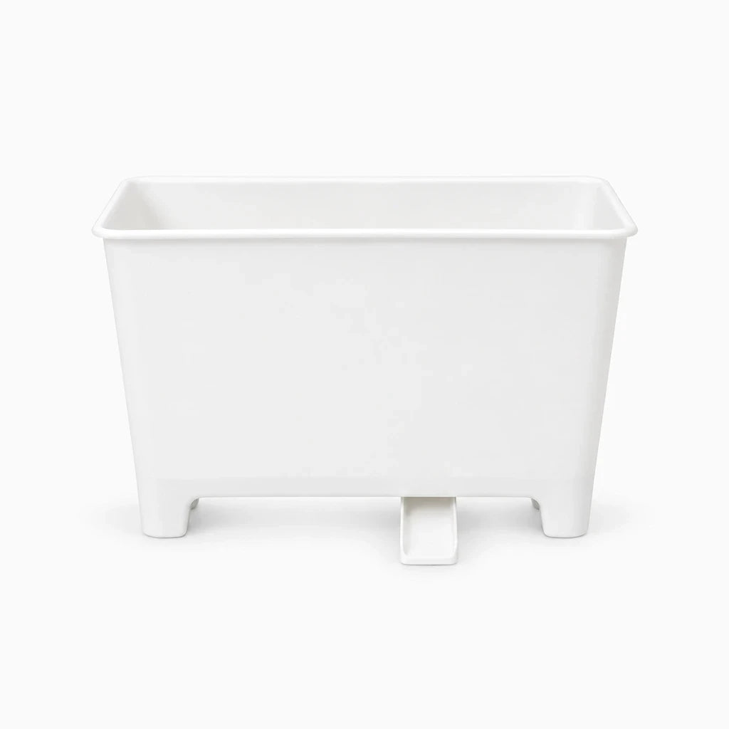 Petite poubelle cuisine compacte fixée au rebord de l'évier avec filtre intégré