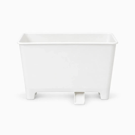 Petite poubelle cuisine compacte fixée au rebord de l'évier avec filtre intégré