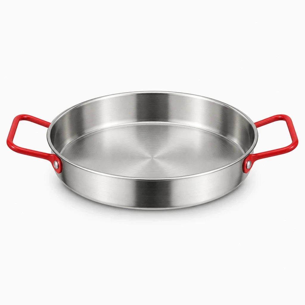 Poêles à paella en inox brillant, détail de la structure et des rebords hauts