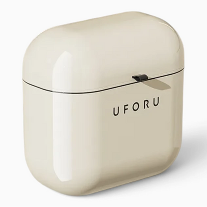 Petit bac à compost de cuisine blanc installé sous l'évier avec poignée ergonomique