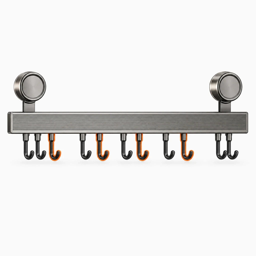 Système de rangement mural cuisine gris, regroupant outils de préparation et ustensiles de cuisson