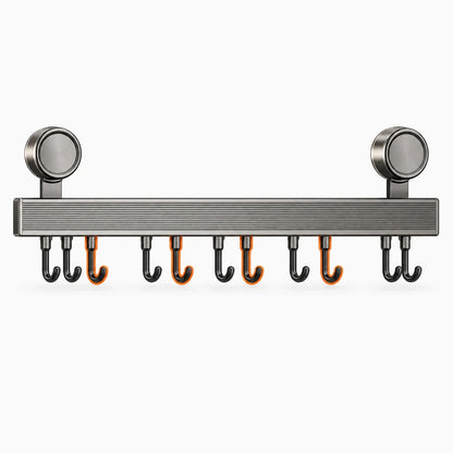 Système de rangement mural cuisine gris, regroupant outils de préparation et ustensiles de cuisson