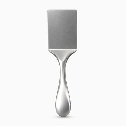 Spatule inox cuisine nettoyée à l'eau, séchée et prête pour utilisation suivante